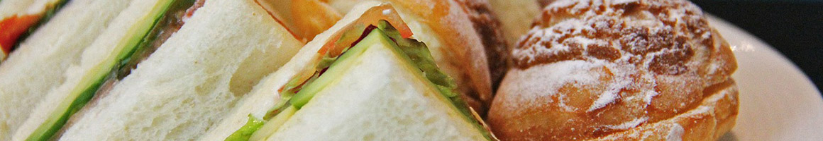 Eating Deli Sandwich at Park Avenue Caterers restaurant in Linden, NJ.